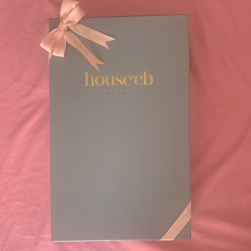 This house of cb dress is a strapless size M, a gorgeous turquoise type of color